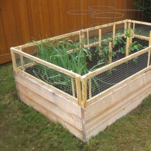 25+ Easy & Inexpensive Waist High Raised Garden Bed Ideas & Plans